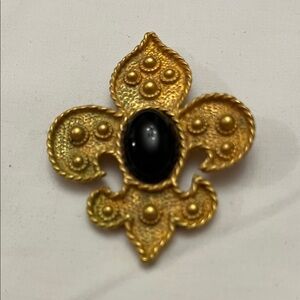 Gold Brooch with Black